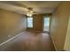 Spacious bedroom with ample natural light and neutral carpeting at 5164 Conroy Rd # 1526, Orlando, FL 32811