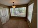 Bright bedroom with large windows showcasing a lake view at 5164 Conroy Rd # 1526, Orlando, FL 32811