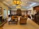 Inviting clubhouse featuring elegant seating, wood accents, and warm lighting for residents' enjoyment at 5164 Conroy Rd # 1526, Orlando, FL 32811