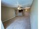 Spacious living room with an open floor plan to the kitchen at 5164 Conroy Rd # 1526, Orlando, FL 32811