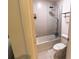 Bathroom with glass shower enclosure, toilet, and tiled floor at 5245 W Irlo Bronson Memorial Hwy # 151, Kissimmee, FL 34746