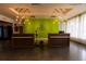 The lobby is bright and modern with check-in desks, and hanging lights at 5245 W Irlo Bronson Memorial Hwy # 151, Kissimmee, FL 34746