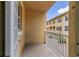 Private balcony with a view of the community and adjacent residences at 724 Greybull Run, Lake Mary, FL 32746