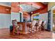 Stylish bar area with seating, hardwood floors, and great view at 724 Greybull Run, Lake Mary, FL 32746