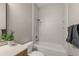 Bright bathroom features a tub with white subway tile surround and a handheld shower head at 724 Greybull Run, Lake Mary, FL 32746