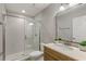 Stylish bathroom with walk-in shower, a single sink vanity, and a modern aesthetic at 724 Greybull Run, Lake Mary, FL 32746