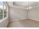 Bright dining room with large windows and tile flooring at 724 Greybull Run, Lake Mary, FL 32746