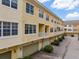 Townhome exterior featuring 2-car garages, individual balconies, and well-maintained landscaping at 724 Greybull Run, Lake Mary, FL 32746