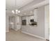 Modern kitchen features stainless steel appliances, granite countertops, and white cabinetry at 724 Greybull Run, Lake Mary, FL 32746