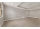 Bright living room boasts tile floors, neutral walls, white trim, recessed lighting, and a ceiling fan at 724 Greybull Run, Lake Mary, FL 32746