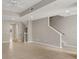 Bright living room boasts tile floors, neutral walls, white trim, and recessed lighting at 724 Greybull Run, Lake Mary, FL 32746