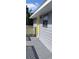 Charming side entrance and wooden porch to back yard at 9315 9Th Ave, Orlando, FL 32824