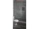 Updated bathroom featuring a new shower with updated tile work, a modern design at 9315 9Th Ave, Orlando, FL 32824