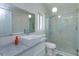 Modern bathroom featuring marble wall tiles, glass enclosed shower, and vessel sink at 1023 Royal Oaks Dr, Apopka, FL 32703