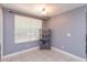 Bright kitchen area with a window, neutral-colored walls, and tiled floors at 1023 Royal Oaks Dr, Apopka, FL 32703