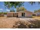 View of backyard with sliding doors leading to patio, showcasing the outdoor living potential at 1084 Doyle Rd, Deltona, FL 32725