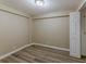 Cozy bedroom with wood flooring and an open closet at 1084 Doyle Rd, Deltona, FL 32725