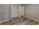Bedroom with wood flooring and small closet at 1084 Doyle Rd, Deltona, FL 32725