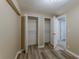 Bedroom with two closets and wood flooring at 1084 Doyle Rd, Deltona, FL 32725