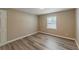 Bedroom with wood flooring and window at 1084 Doyle Rd, Deltona, FL 32725