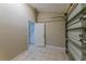 Garage with neutral paint and access to a bonus room at 1084 Doyle Rd, Deltona, FL 32725