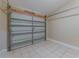 Garage with large door and neutral paint at 1084 Doyle Rd, Deltona, FL 32725