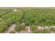 An aerial shot of the home and surrounding treed neighborhood at 1100 Oday Dr, Winter Springs, FL 32708