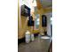 Bathroom featuring updated vanity, granite counters, and decorative shelves at 1100 Oday Dr, Winter Springs, FL 32708