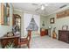 Inviting living room with tile floors, vintage decor, and abundant natural light at 1100 Oday Dr, Winter Springs, FL 32708