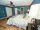 Comfortable main bedroom with an en-suite bathroom, offering a relaxing retreat with ample space and natural light at 11742 Chateaubriand Ave, Orlando, FL 32836