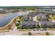 Aerial view showing the community, adjacent to a lake, and scenic surroundings at 11957 Vermillion Ave, Windermere, FL 34786