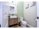 Charming half bathroom with modern fixtures, including a vessel sink, vanity, and decorative accents at 11957 Vermillion Ave, Windermere, FL 34786
