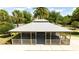 A top-down shot of the gazebo featuring picnic tables with a well-maintained landscape at 11957 Vermillion Ave, Windermere, FL 34786