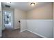 Bright hallway upstairs, showing access to other rooms at 11957 Vermillion Ave, Windermere, FL 34786