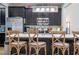 Modern kitchen boasts quartz counters, stainless appliances, and ample storage at 11957 Vermillion Ave, Windermere, FL 34786