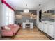 Bright living area with wood-look flooring, modern decor, and ample natural light at 11957 Vermillion Ave, Windermere, FL 34786