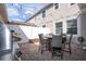 Charming patio with brick pavers, outdoor seating, and privacy fence, perfect for entertaining at 11957 Vermillion Ave, Windermere, FL 34786