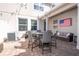 Inviting patio features comfortable seating, stylish decor, and shaded area, ideal for relaxation at 11957 Vermillion Ave, Windermere, FL 34786