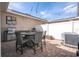 Outdoor patio features a barbecue grill, outdoor dining furniture, and a privacy fence at 11957 Vermillion Ave, Windermere, FL 34786