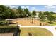 Community playground with slides and various playing equipment, providing outdoor fun for the Gathering at 11957 Vermillion Ave, Windermere, FL 34786
