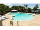 Resort-style pool with lounge chairs, covered seating, and lifeguard stations at 11957 Vermillion Ave, Windermere, FL 34786