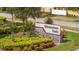 Beautifully landscaped Windermere Trails community sign with stone accents at 11957 Vermillion Ave, Windermere, FL 34786