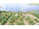 Aerial view of the waterfront homes and private boat docks on the lake at 12454 S Lake Mary Jane Rd, Orlando, FL 32832