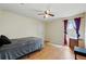 This bedroom features a large window and a standard closet at 13054 Prairie Meadows Dr, Orlando, FL 32837