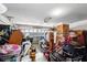 Spacious garage interior, packed with belongings, offering potential for parking and storage at 13054 Prairie Meadows Dr, Orlando, FL 32837