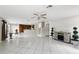 Spacious living area with tile floors, open layout, and seamless flow to the kitchen at 13054 Prairie Meadows Dr, Orlando, FL 32837