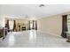 Inviting living room with tiled flooring, a fireplace, and natural lighting at 13054 Prairie Meadows Dr, Orlando, FL 32837
