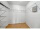 This is a standard walk in closet with shelving at 13054 Prairie Meadows Dr, Orlando, FL 32837