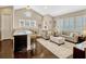Open-concept area seamlessly blends the kitchen island with the cozy living space at 14025 Hench Ln, Orlando, FL 32827
