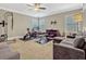 A workout room is equipped with exercise bikes, weights, and a comfortable seating area at 14025 Hench Ln, Orlando, FL 32827